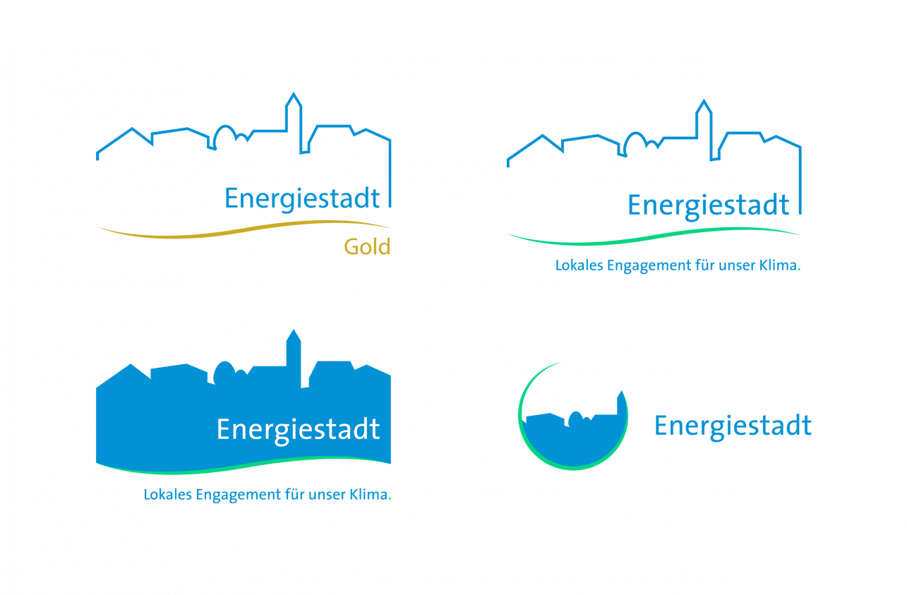 Ansicht mit 4 verschiedenen Logos des Labels Energiestadt: das Standardlogo ausgefüllt und nicht ausgefüllt, das Logo Gold und das Logo für die Website